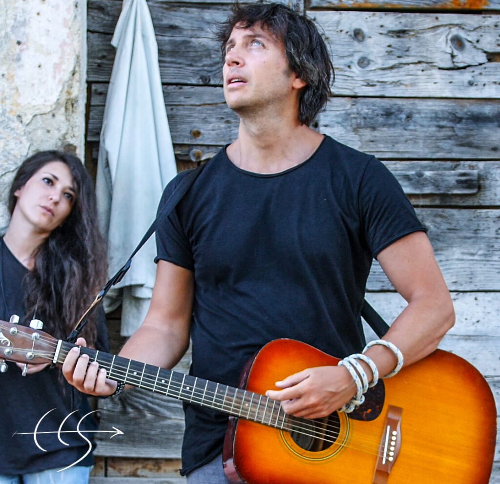 Carmine Cristallo Scalzi playing guitar
